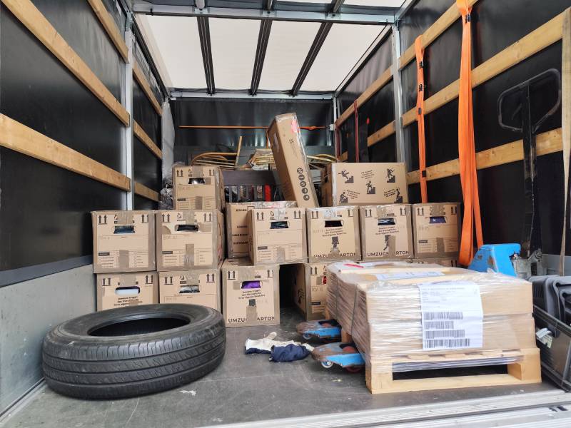 Our boxes in the back of a van